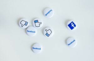 buttons with icons for facebook likes and logos on a white background